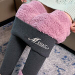 collant chauffant gris et rose porter par une femme