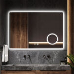 Miroir éclairé en salle de bain au-dessus d'un lavabo gris